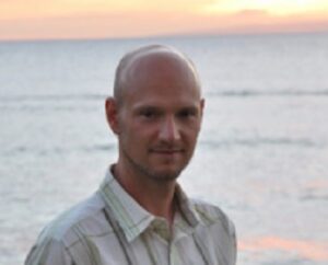 Formal headshot of faculty member David Hawkins.