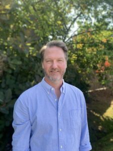 Formal headshot of faculty member Damon Page.