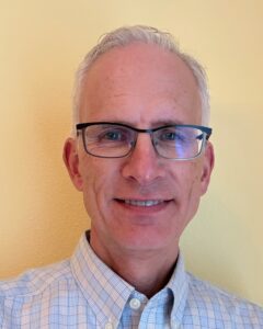 Formal headshot of faculty member William Stafford Noble.