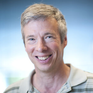 Formal headshot of faculty member Paul Lampe.