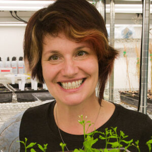 Formal headshot of faculty member Christine Queitsch in lab.