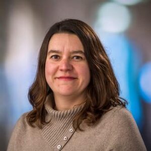 Formal headshot of faculty member Jenny Lund.
