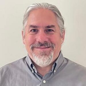 Formal headshot of faculty member Dave Raible.