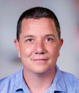 Formal headshot of faculty member James Alvarez.