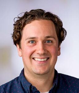 Formal headshot of faculty member Kevin Barry.