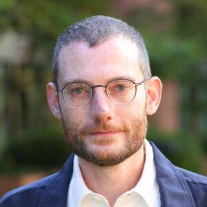 Formal headshot of faculty member Trevor Bedford.