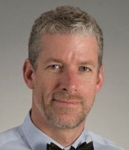 Formal headshot of faculty member Brad Cookson.