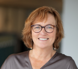 Formal headshot of faculty member Valerie Daggett.