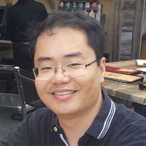 Headshot of faculty member Liangcai Gu.