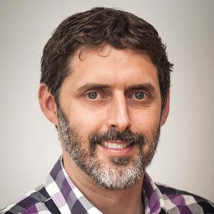 Formal headshot of faculty member Richard James.