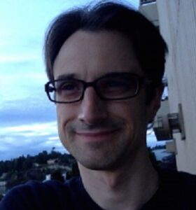 Formal headshot of faculty member Benjamin Kerr.