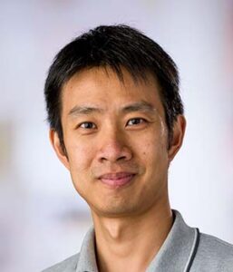 Formal headshot of faculty member Stanley Lee.