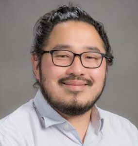 Formal headshot of faculty member Patrick Mitchell.