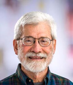 Formal headshot of faculty member Gerald Smith.