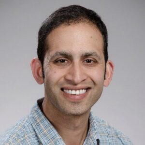 Formal headshot of faculty member Ajai Dandekar.