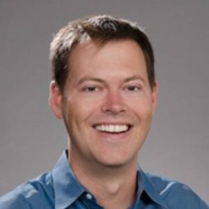 Formal headshot of faculty member Alexander Greninger.