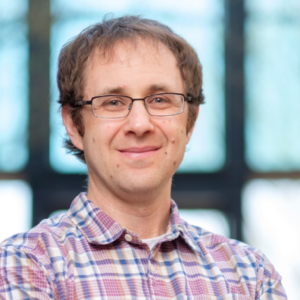 Formal headshot of faculty member Jesse Bloom.