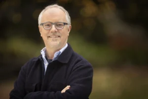 Formal headshot of faculty member Charles Asbury.