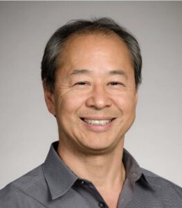 Formal headshot of faculty member Brian Iritani.