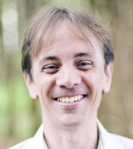 Formal headshot of faculty member Dustin Maly.
