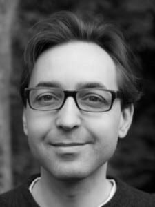 Formal headshot of faculty member Alexey Merz.
