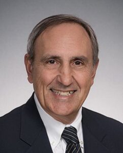 Formal headshot of faculty member Samuel Miller.