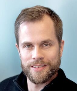 Formal headshot of faculty member Andrew Oberst.