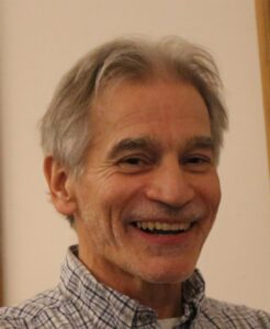 Formal headshot of faculty member Tom Reh.