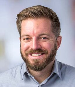 Formal headshot of faculty member Lucas Sullivan.