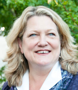 Formal headshot of faculty member Billie Swalla.