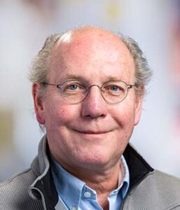 Formal headshot of faculty member Stephen Tapscott.