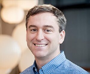 Formal headshot of faculty member James Bennett.