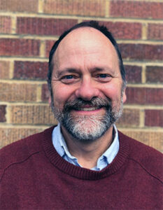Formal headshot of faculty member Robert Cornell.
