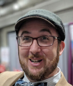 Formal headshot of faculty member Alexander Mendenhall.