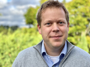 Formal headshot of faculty member Danny Miller.