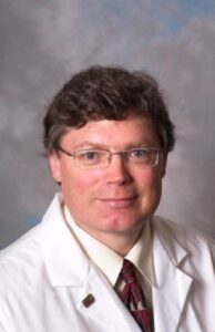 Formal headshot of faculty member Kelly Smith.
