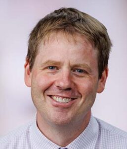 Formal headshot of faculty member Joshua Veatch.
