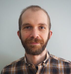 Formal headshot of faculty member Willem Laursen.