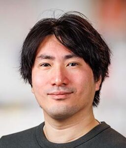 Formal headshot of faculty member Yasuhiro Arimura.