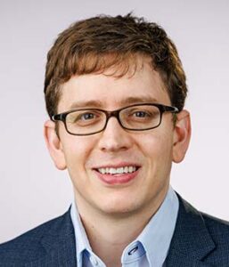 Formal headshot of faculty member Aaron Ring.