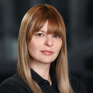 Formal headshot of faculty member Mara Pavel-Dinu.