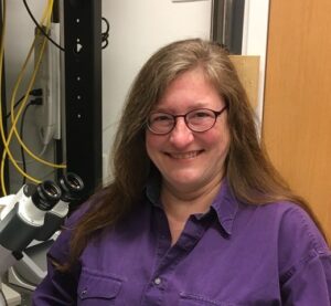 Headshot of faculty member Julie Theriot in lab.