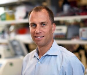 Formal headshot of faculty member Andras Heczey.