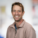 Formal headshot of faculty member Dr. Sylvain Simon