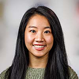 Professional headshot of MCB staff member Bao-Han Nguyen with a multi-colored background.